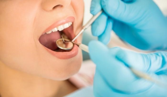 عفونت دندان عقل: درمان با روش های درمان دندانپزشکی و خانگی - کلینیک دندانپزشکی محتشم اصفهان